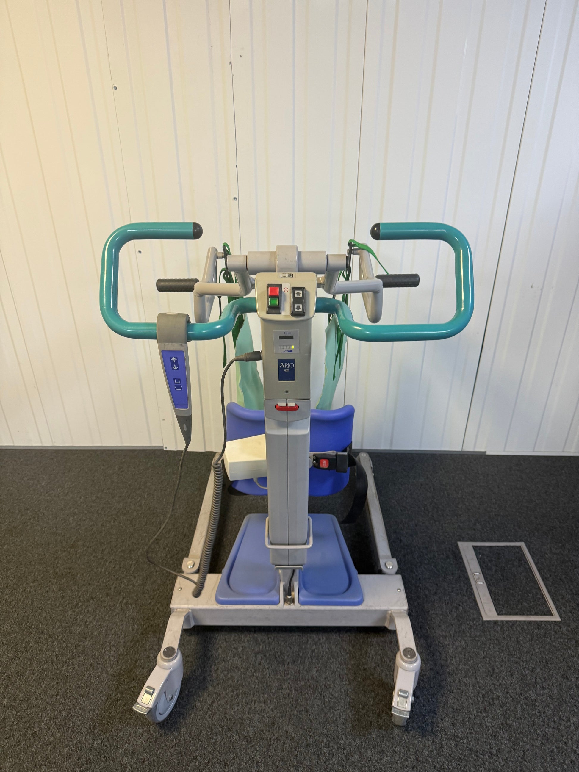 Back view of hoist showing battery compartment and wheels