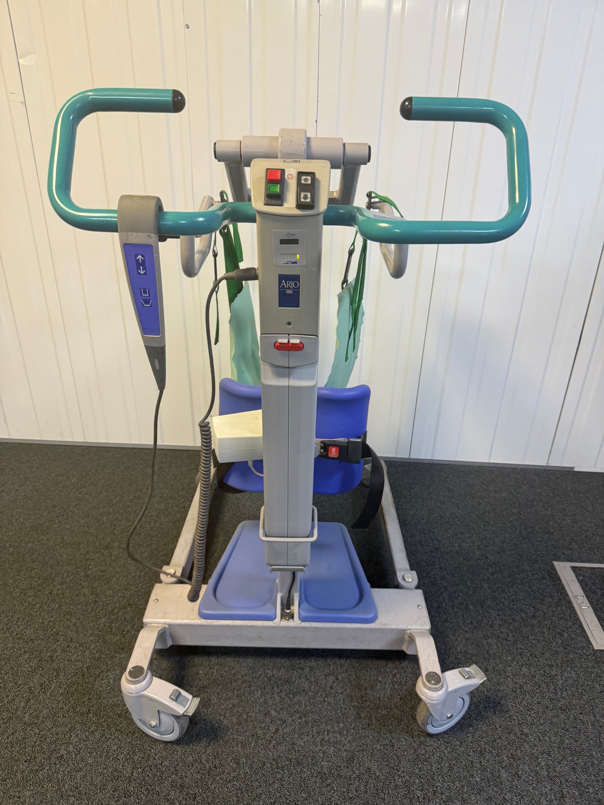 Rear view of hoist showing battery compartment and wheels