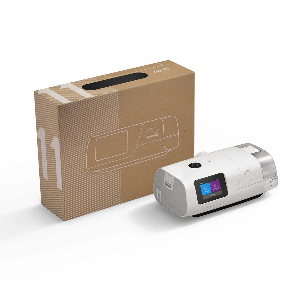 ResMed AirCurve 11 VAuto device with a screen next to its cardboard box on a white background